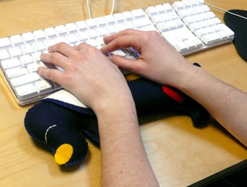 Totally Geeky or Geek Chic? Sleepy Dog Wrist Cushion